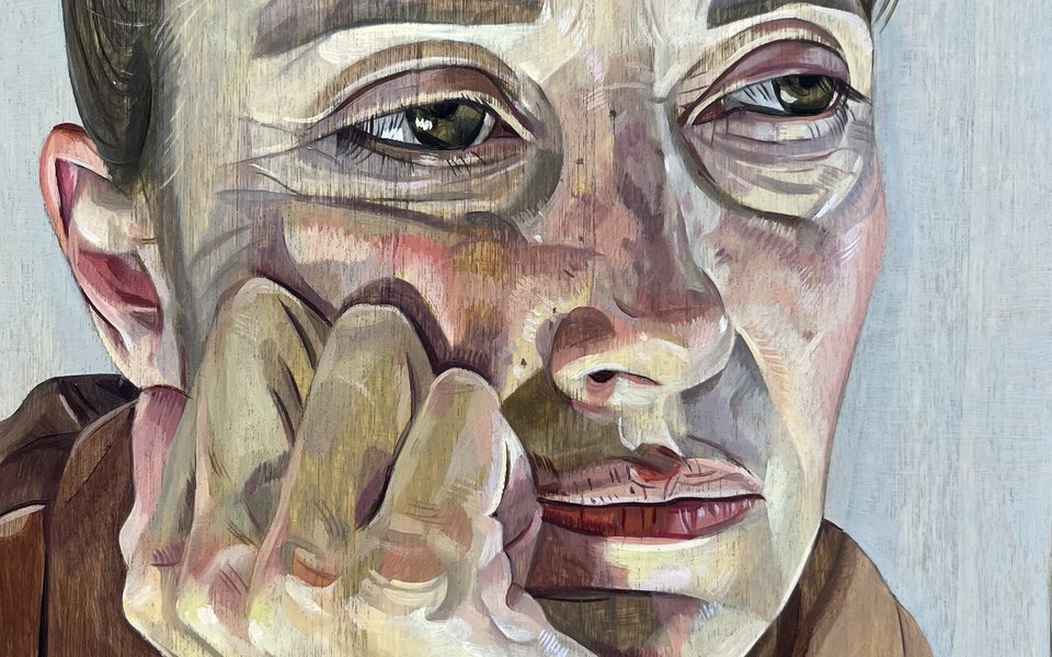 Portrait of a woman focusing on face.