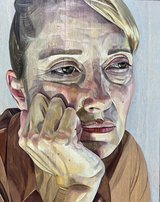 Portrait of a woman focusing on face.