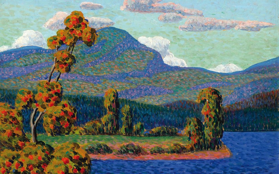 A landscape with a tree with red leaves or fruit in the foreground with a green mountain in the background and a lake in the middle