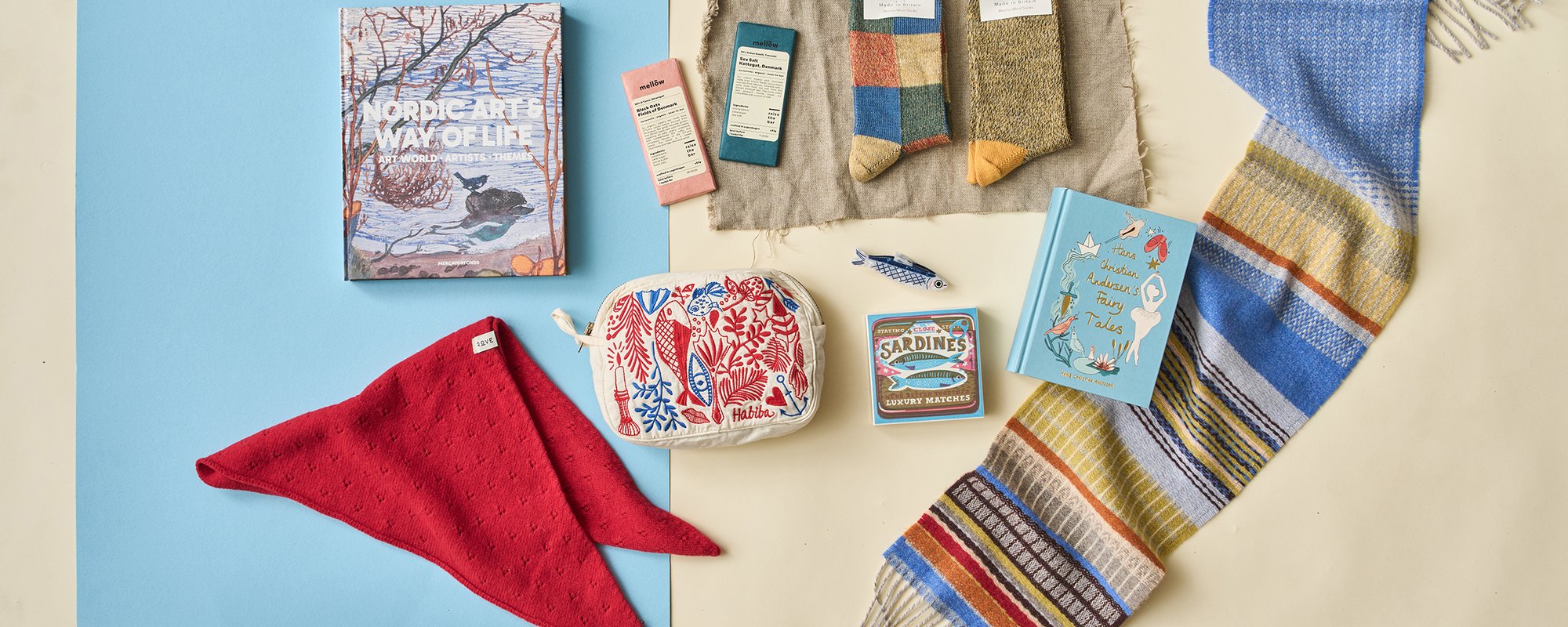 Flat lay of products including scarfs and socks.
