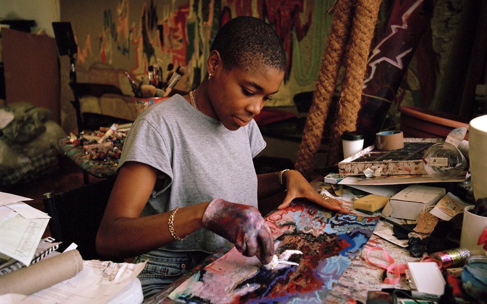 Rachel Jones in her studio, working with oil sticks