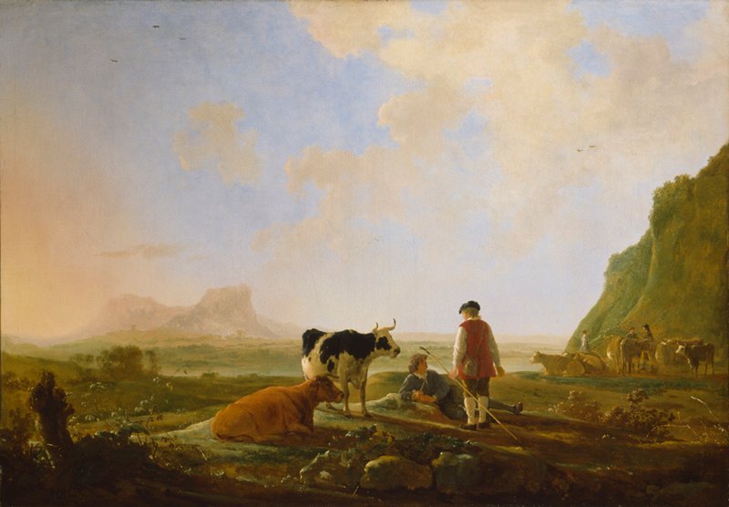 Landscape of fields and woods with mountains at the background and in the forefront a group of cows and a man.