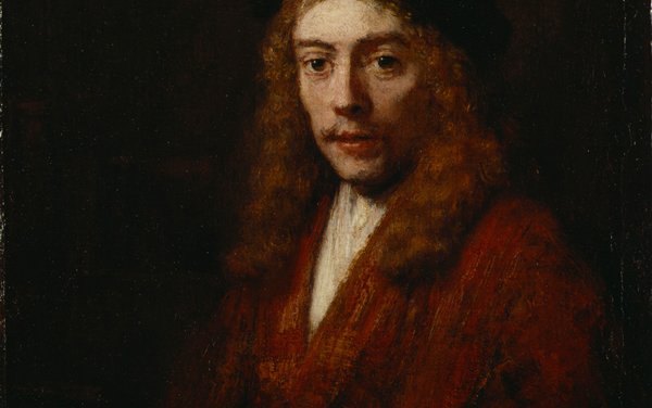 Portrait of a man with long curly brown hair wearing a black hat and red brown jacket with a white shirt.