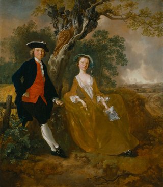 A couple sat next to a tree in a landscape. The man wears a black hat, black jacket with a red shirt and white neckerchief with black pantaloons with long white socks. The woman wears a large orange brown dress and holds a paper sketch in her hand.