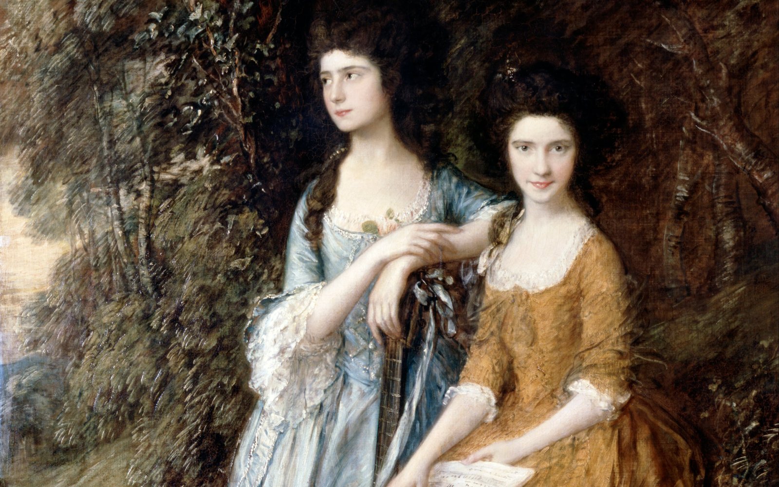 Portrait of two women. One left in a light blue dress with long dark hair tied back leaning on shoulder of woman right in orange brown dress with long dark hair arranged on top of her head. She holds sheet music in her lap.