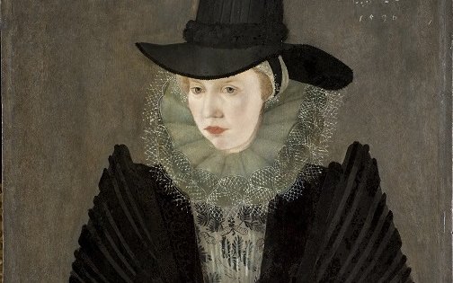 Portrait of a person wearing an elaborate black dress with puffed sleeves, a tall black hat, and a detailed lace ruff collar.