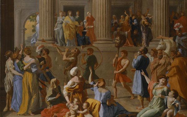 A triumphal march with a man holding a large head on a pike with trumpeters ahead of him. All around are cheering groups of people in bright clothing.