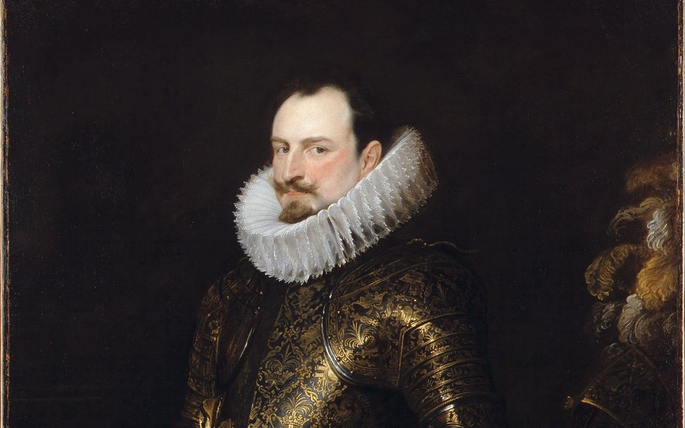Portrait of a man in a large white rough and black gold etched armour.