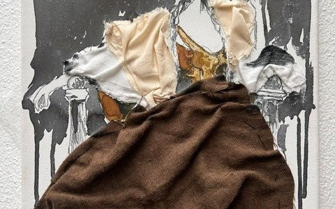 A collage work of paint and textile of a woman