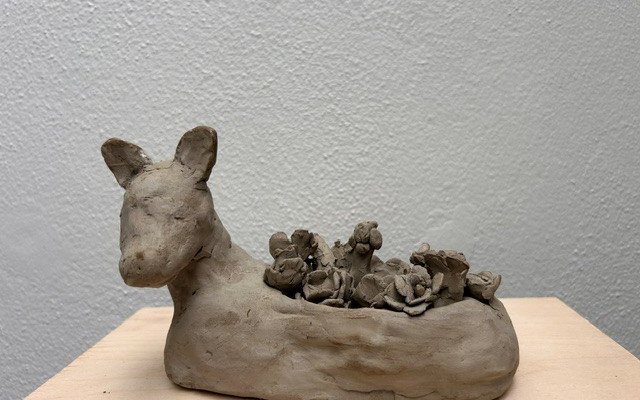 Abstract clay animal like figure