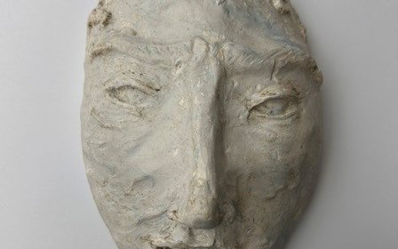 A clay mask of a face